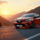 Renault Clio 2 V6 au lever du soleil en montagne